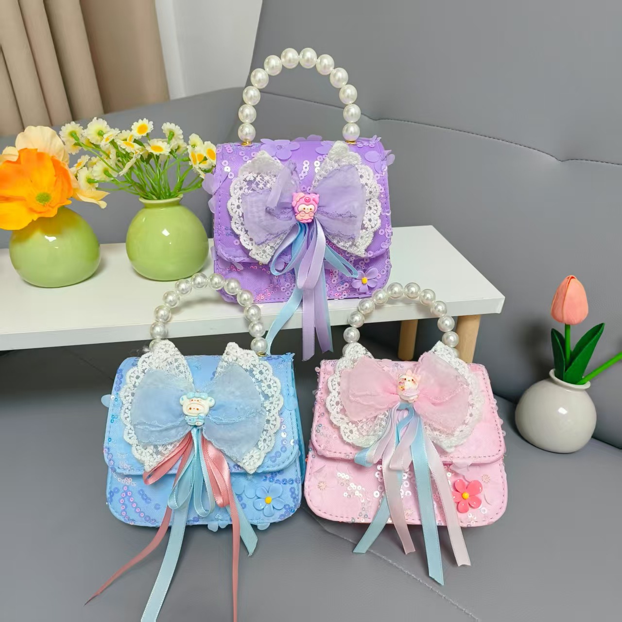 Bow princess pearl bolso Melody KT felino mochila accesorios de chicas pequeñas cadenas de viento fragante bolso para niños