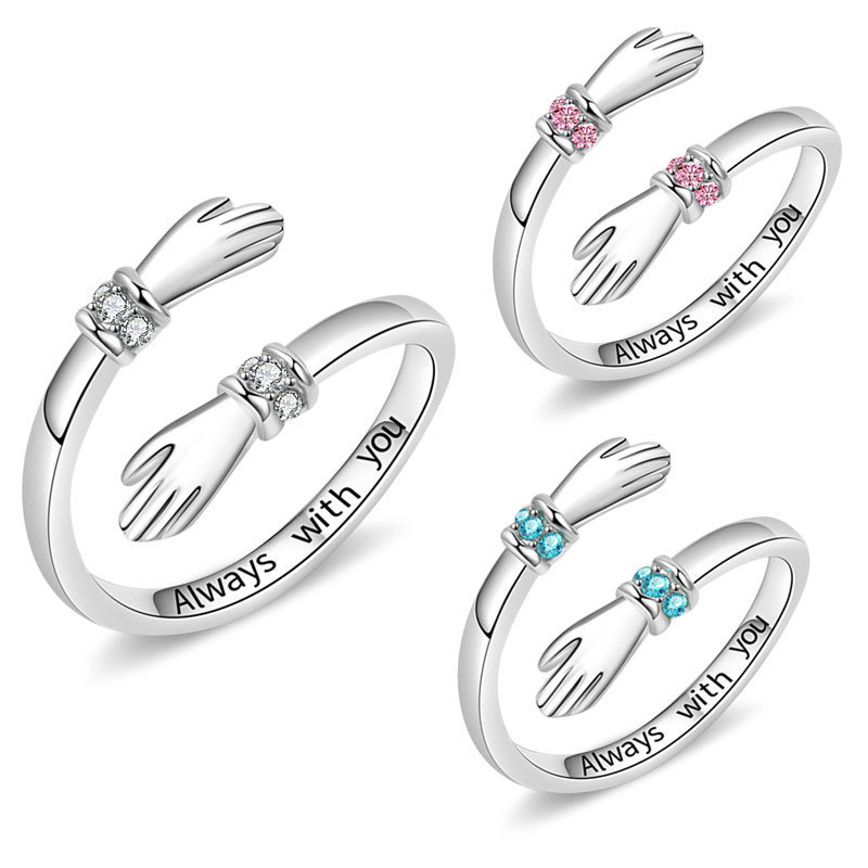 Cross-border hot sale hands hug zircon ring female European and American creative love hug open letter colorful treasure ring female