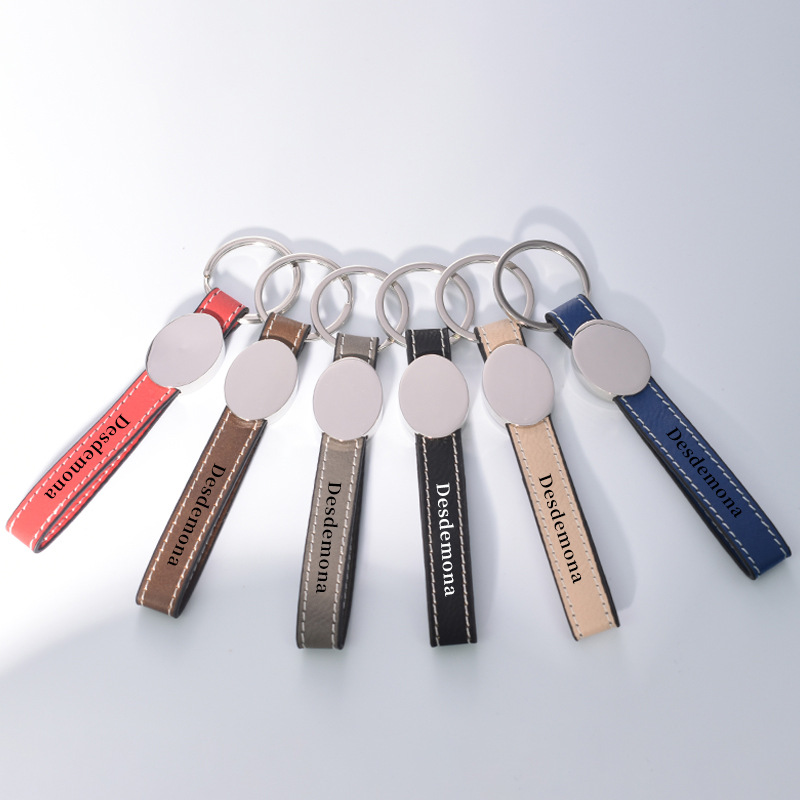 Transfronterizos en blanco spot embrión láser de cuero llavero de metal cuero colgante de automóvil personalizado regalos de negocios de alta calidad