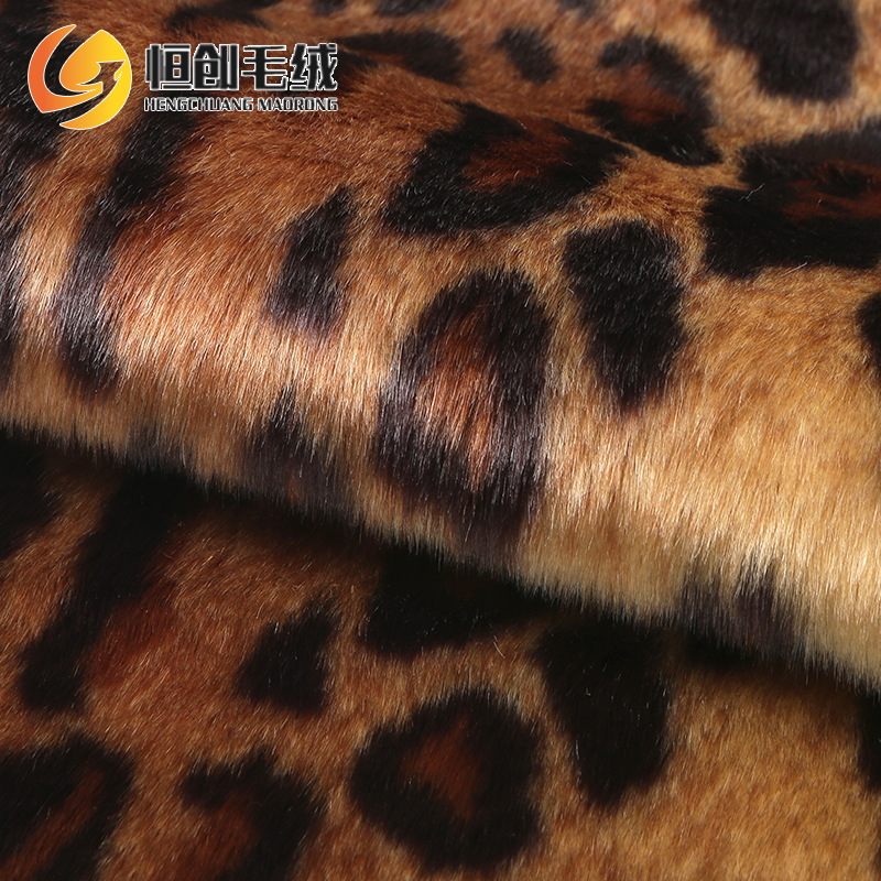 秋冬服装提花印花人造毛绒面料批发 豹纹提花毛皮 仿动物皮草布料