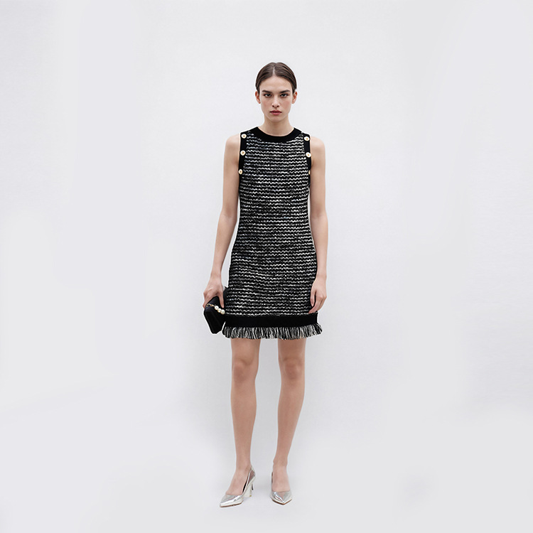 Elite summer elegant black knitted dress with a round collar…