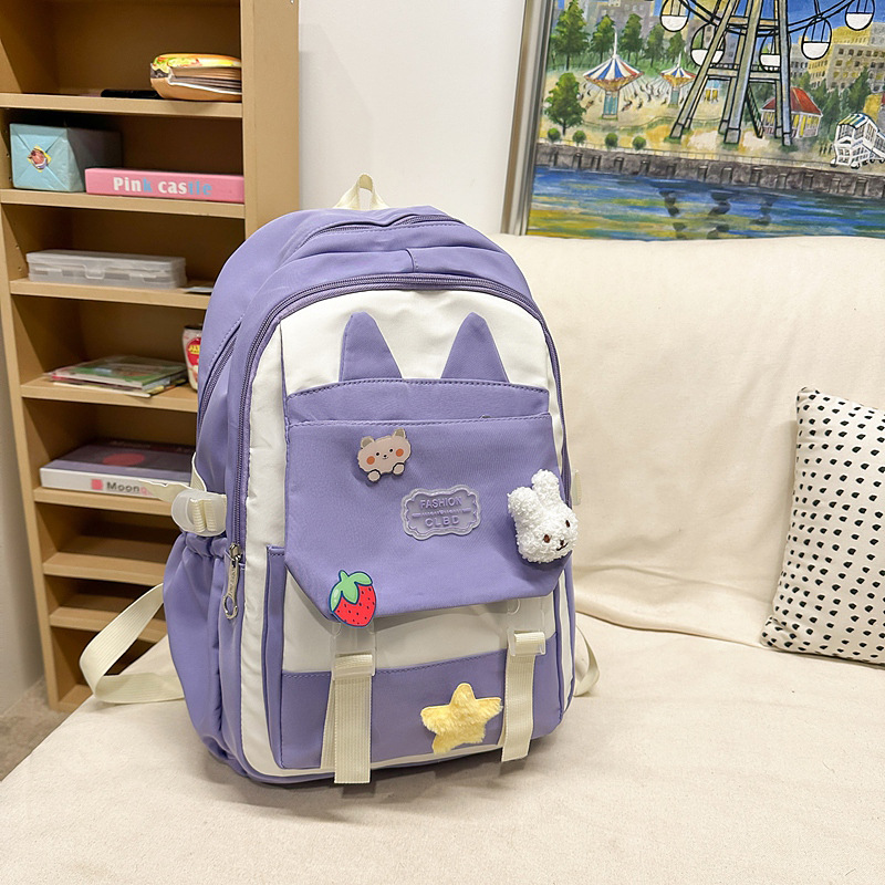 La versión coreana de las mochilas escolares de doble hombro está llena de mochilas escolares de primaria y mochilas escolares de tendencia de la escuela secundaria de gran capacidad.