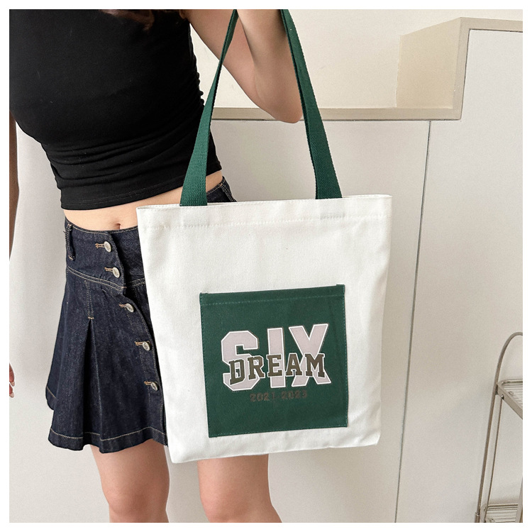 Wholesale of 2025 new casual and fashionable canvas bags, large-capacity single-shoulder bags for college students' shopping, and trendy tote bags undefined