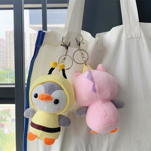 Cute penguin plush toy transforms into a dinosaur and frog catching machine, wedding celebration throwing plush doll and rag doll