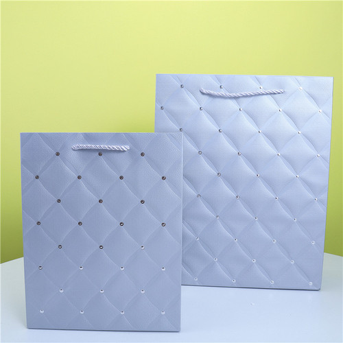 Gold foil embossed white card gift bag single color round dot gold foil hand-held paper bag foreign trade packaging paper bag
