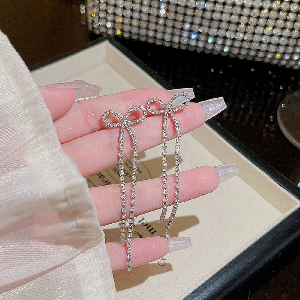 S925 aguja de plata elegante borla pendientes de alta gama simple cara de adelgazamiento pendientes de todo fósforo estilo coreano nuevos pendientes de moda al por mayor