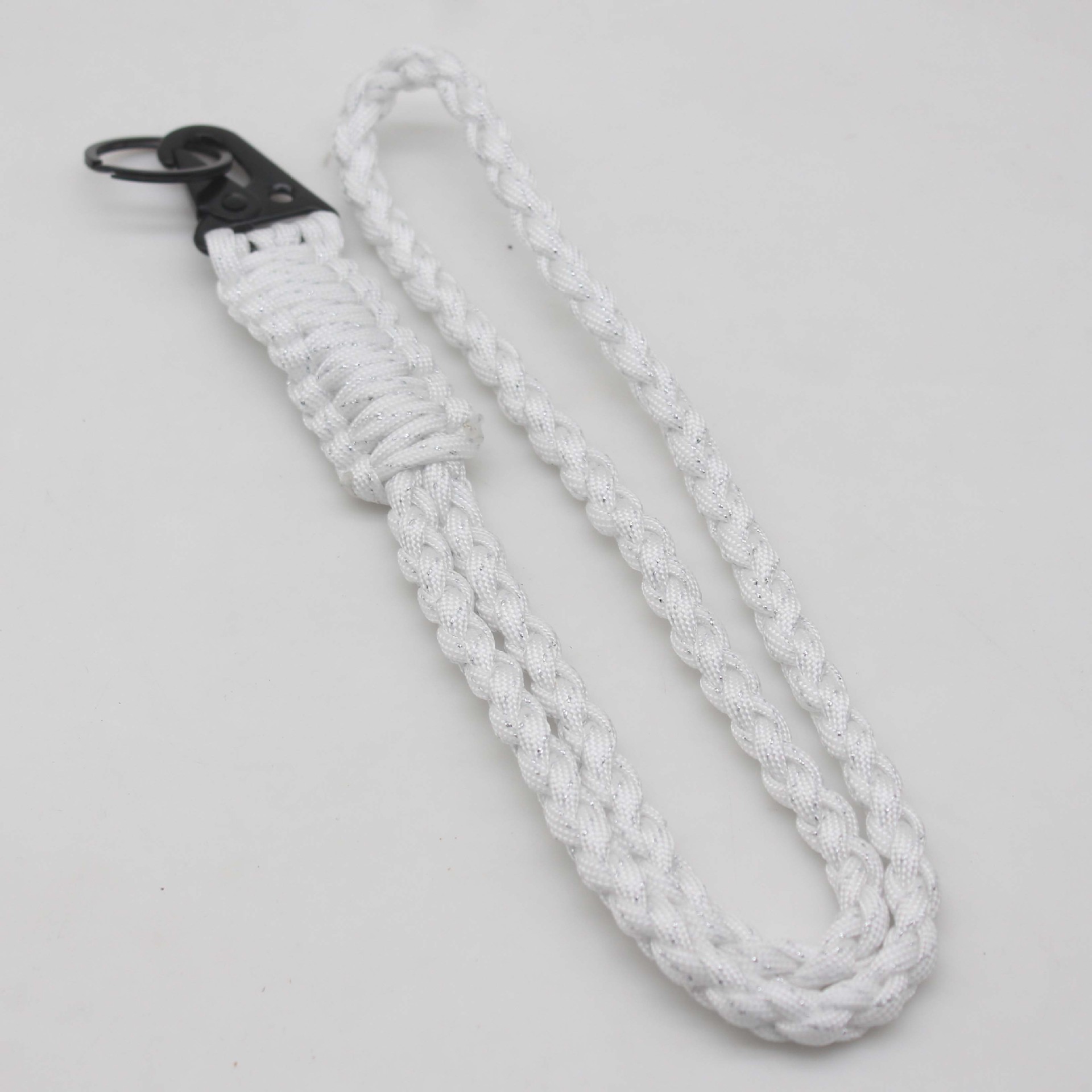 Venta caliente cordón tejido paraguas cuerda cuello cordón teléfono móvil llavero tejido siete núcleos paraguas cuerda acampar al aire libre emergencia