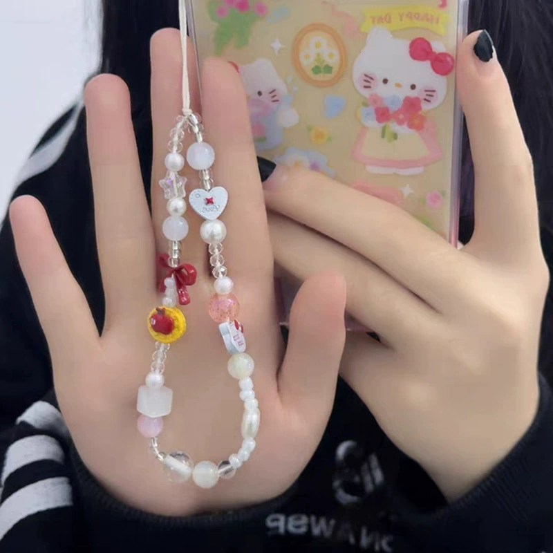 Mobile phone with bow, brand strap, camera, pendant, DIY
