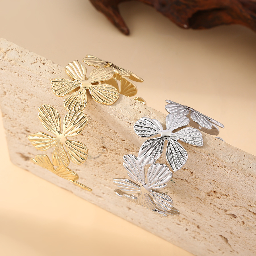 Europa y los Estados Unidos explotaron pulseras de flores de moda personalidad femenina de apertura retro empalme diseño ancho nicho de diseño de joyas