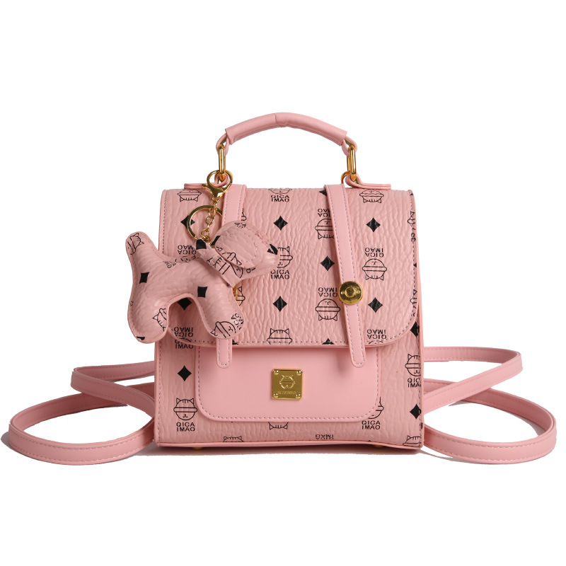Mochila de moda coreana para mujer, bolso de mensajero con estampado de moda ringge de estilo occidental, bolso de viaje con colgante de cachorro lindo