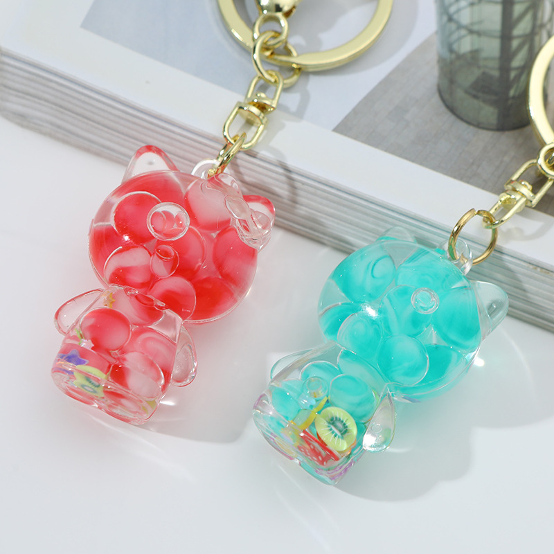 Caricatura KT en botella de arena flotante de aceite en burbujas de aceite llavero llavero de automóvil regalos de vacaciones