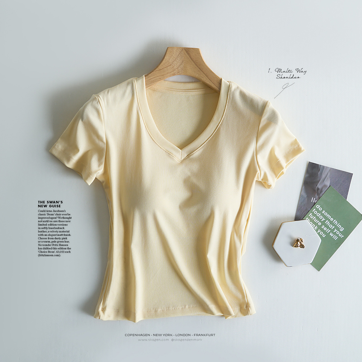 Tensei Lesser Almohadilla para el pecho con cinturón de algodón para mujer Camiseta blanca de manga corta con cuello en V para mujer Verano nuevo top casual de nicho de hombro