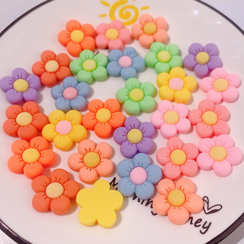 Accesorios de resina de cinco pétalos de color directo transfronterizo DIY pegamento de crema caja de teléfono móvil adornamiento de pelo agujero material de hebilla de zapatos