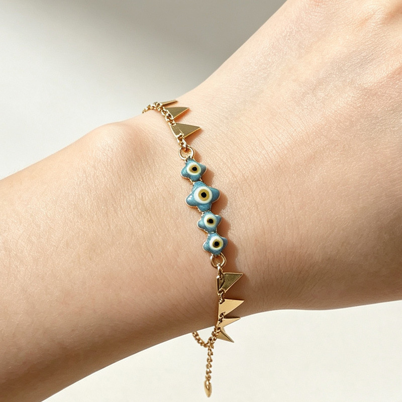 Cross-border subculture blue evil eye triangular gold-plated bracelet for women, ins light luxury versatile four-leaf clover eye bracelet Cross-border subculture blue evil eye triangular gold-plated bracelet for women, ins light luxury versatile four-leaf clover eye bracelet