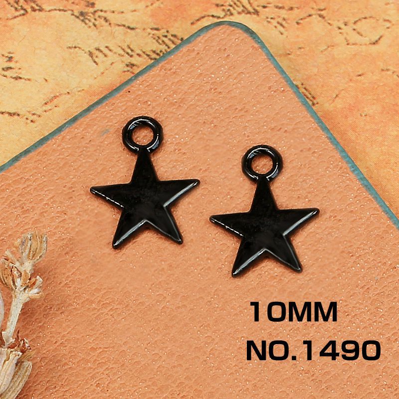 Aleación máscara cráneo electroforesis negro accesorios material al por mayor DIY colgante joyería Cruz alas negro colgante