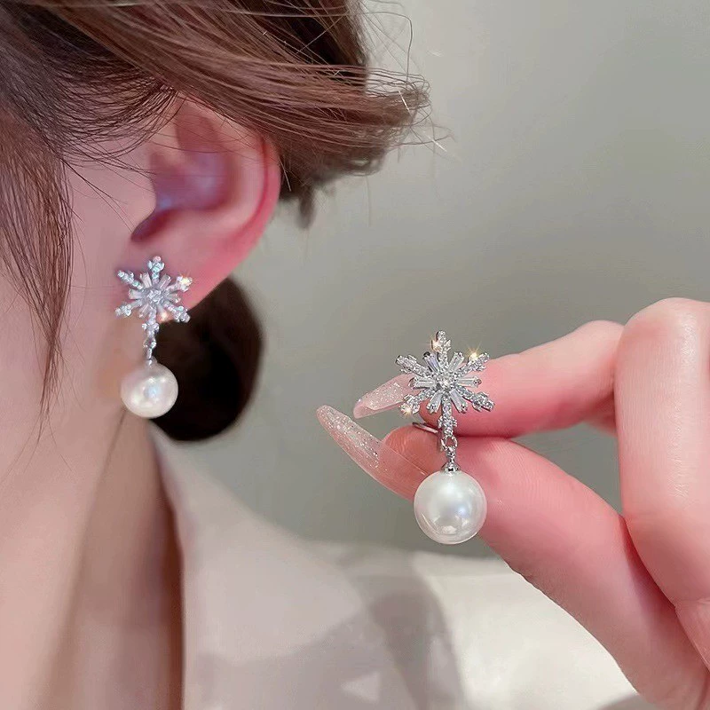 Pearl earrings, small elegant studs, light‑luxury minimalist style