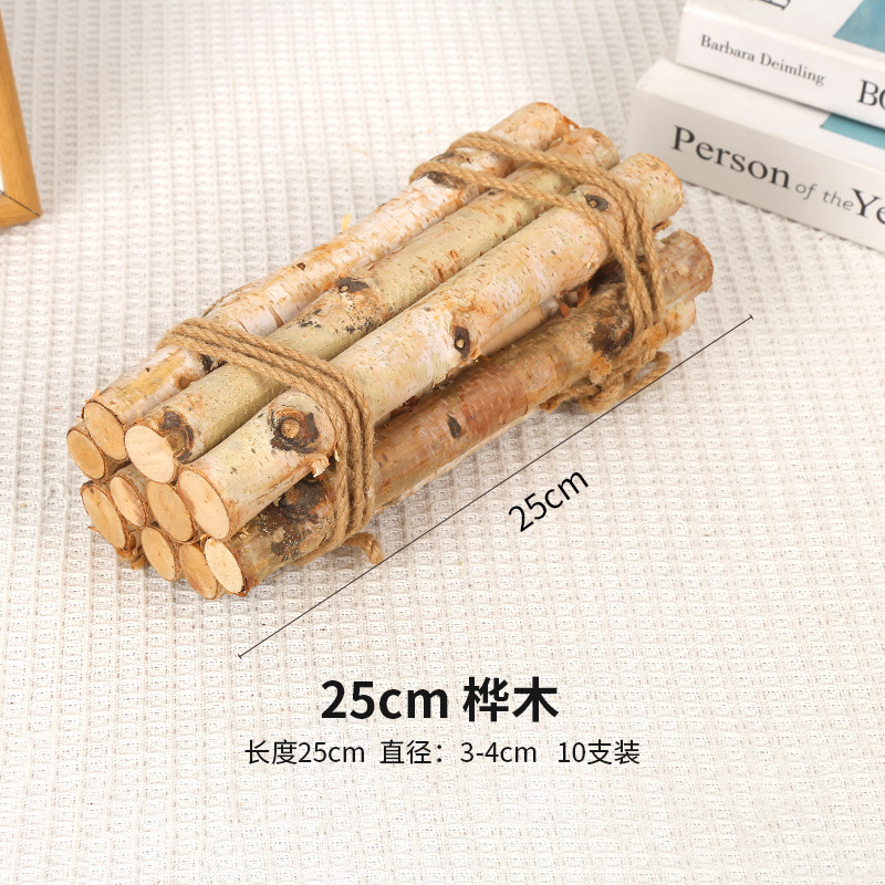 10 que gỗ bạch dương dài 25cm, đường kính khoảng 2-4cm.
