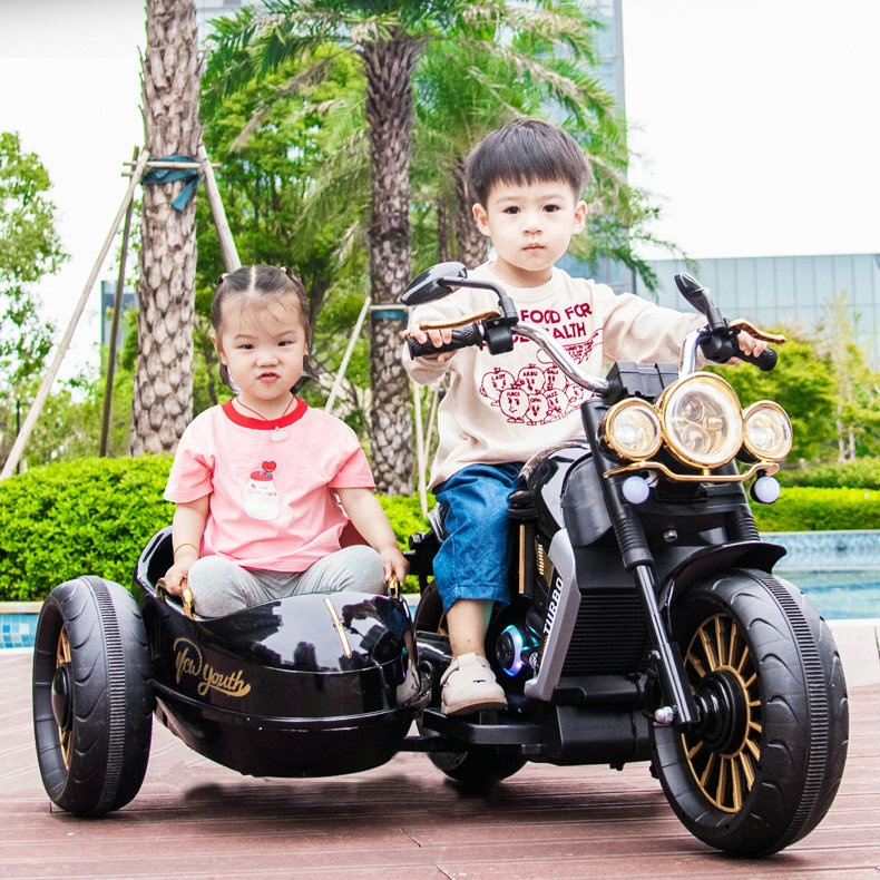 Retro de doble asiento para niños motocicleta eléctrica bebé auto-conducción coche de juguete cochecito eléctrico portátil para niños al por mayor