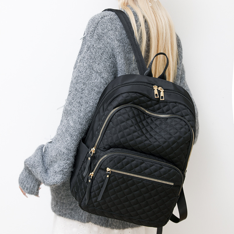 Invierno nueva moda tela de nailon hilo de bordar hombro de rombo anti-salpicaduras de agua casual fabricantes de bolsos de mujer al por mayor envío transfronterizo