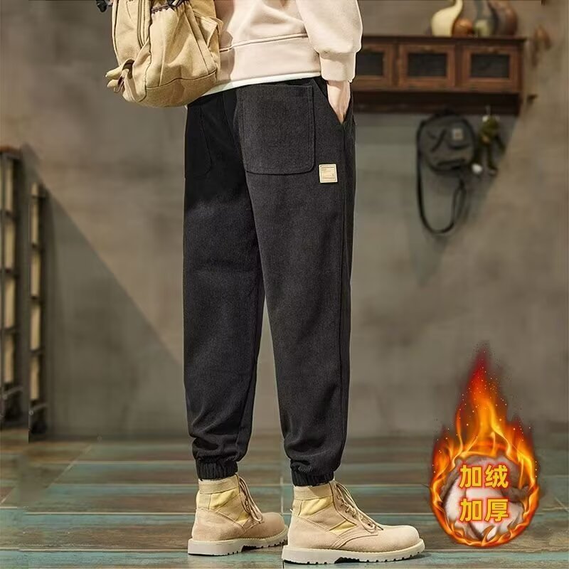 Pantalones casuales de cordillera de hombre, pantalones de caño, pantalones de marca de moda, pantalones de nueve puntos, moda variada.