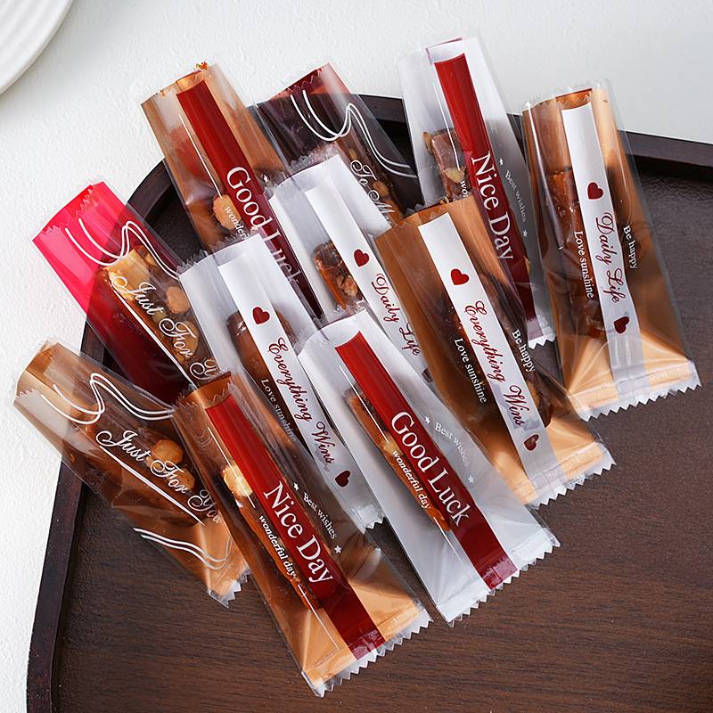 100个装新款海盐杏仁太妃糖包装袋透明英文糖果机封袋牛轧糖袋子