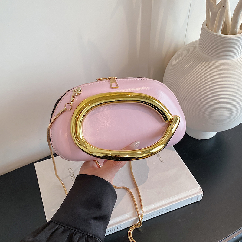 Bolsa de alta sensación para mujeres 2026 primavera nueva bolsa de brazo de viaje de moda simple nicho de diseño de hombro mochila