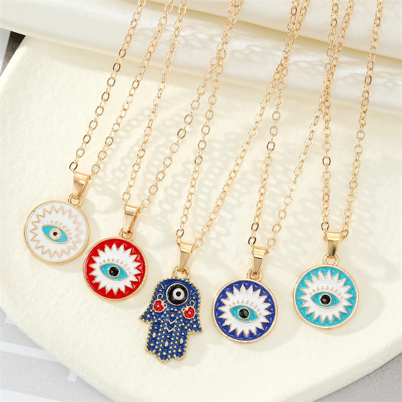retro ethnic color drop oil Turkish devil eye palm pendant metal necklace
