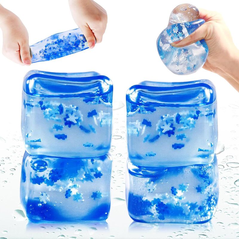 ネットの赤い爆発のココナッツの油の手はボールをつまんでゆっくりとボールをつまんで手でおもちゃの子供のプレゼントを解凍します。|undefined