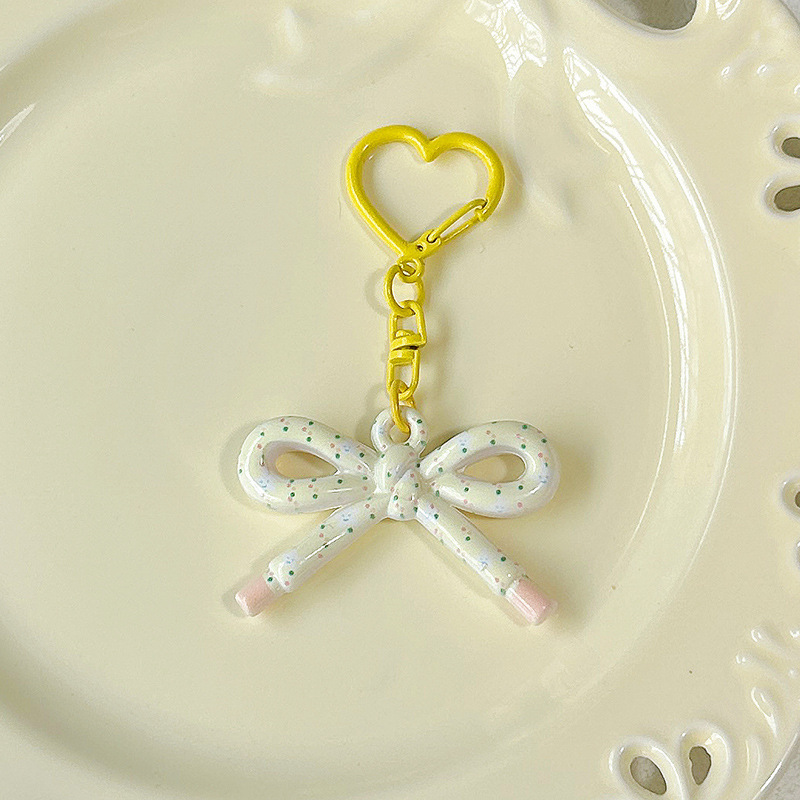 かわいい両面プリント中空弓キーホルダー diy ジュエリーペンダントバッグ携帯電話ペンダントギフトアクセサリー|undefined