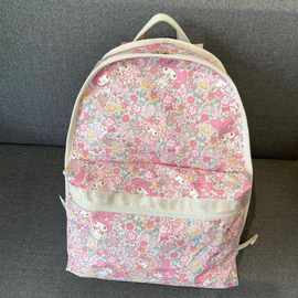 新款百搭休闲双肩包学生书包轻旅游背包卡通联名旅行包