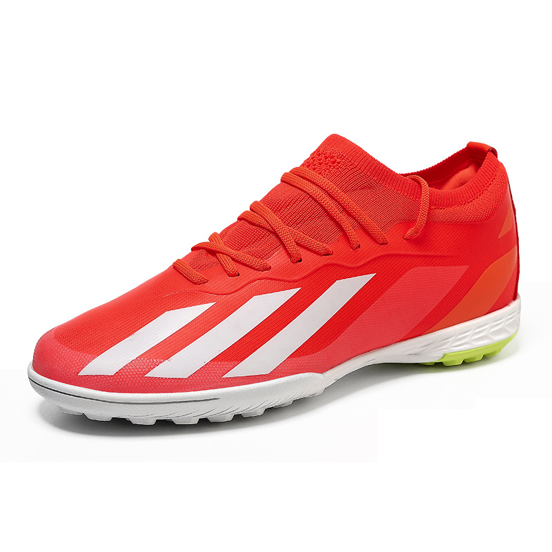 Nuevos zapatos de fútbol transfronterizos SOCCER BOOTS juveniles hombres y mujeres zapatos de entrenamiento de entrenamiento de clavos largos fabricantes