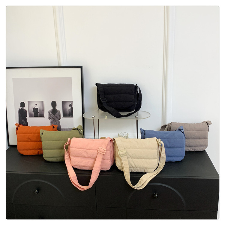 Daily casual simple small square bag Korean spring lightweight personality design popular shoulder crossbody horizontal small square bag_voghion.com