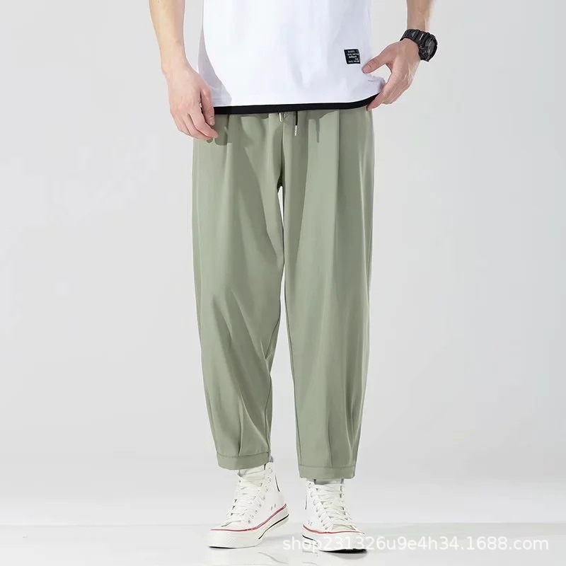 Pantalones casuales de seda de hielo de verano para hombres pantalones sueltos más tamaño noveno pantalones gordos deportes pantalones ultrafinos pantalones de hombre