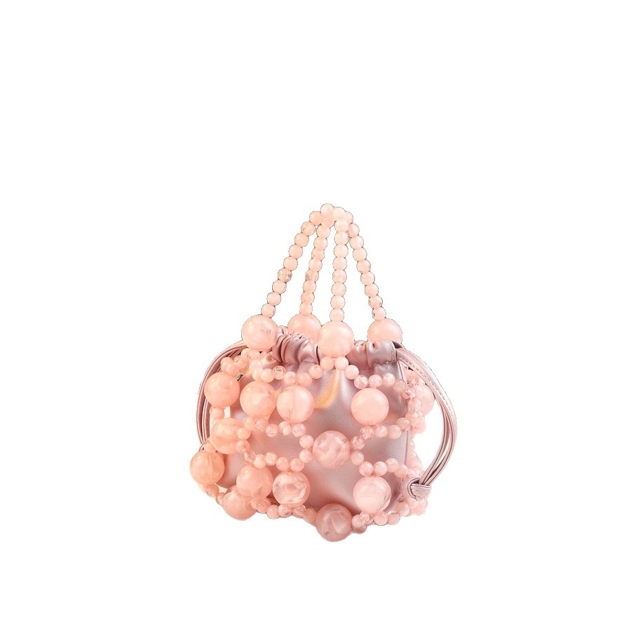 Nuova borsa da donna con design a nicchia in metallo traforato, borsa a secchiello alla moda per feste serali, stile popolare_voghion.com