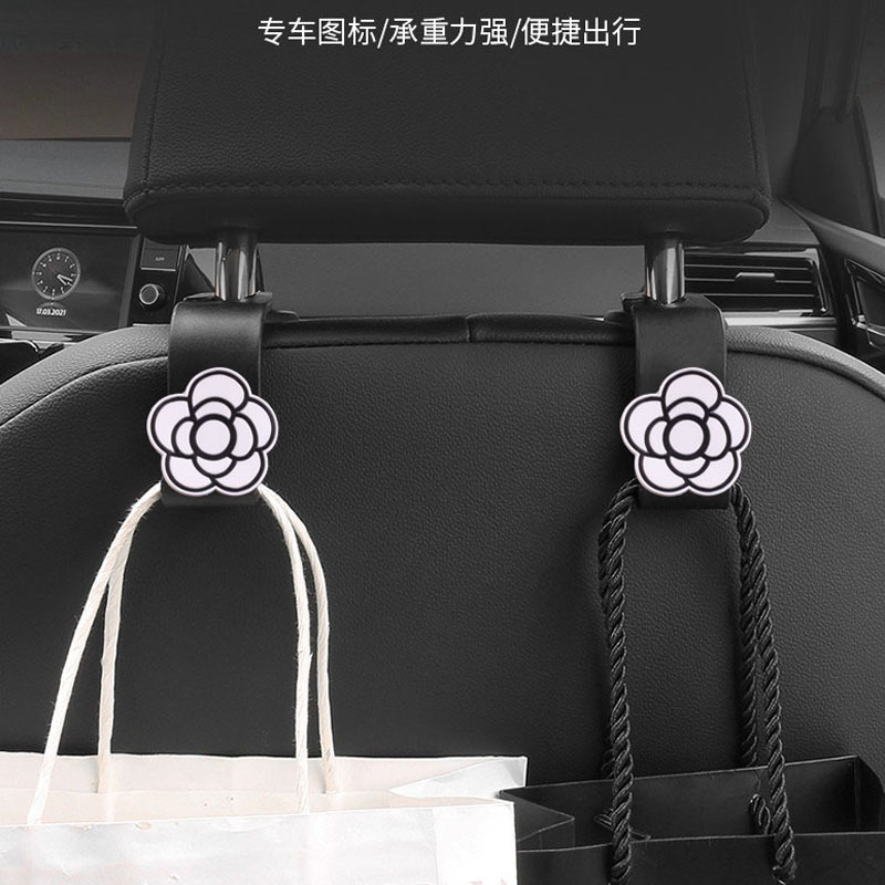 Meiyesi suministros de decoración de automóviles silla trasera gancho de coche celebridad de Internet hermoso gancho de dibujos animados almacenamiento de camelia