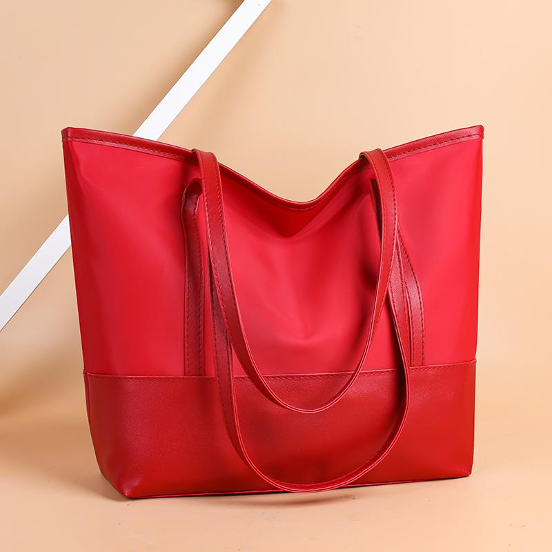 Nuevo bolso de mujer transfronterizo tote 2025 versión coreana de bolso de hombro de gran capacidad Oxford Clothing Split soft Pocket