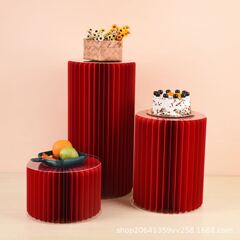 折りたたみのデザート台の新型の道具の結婚式のパーティーの置物の折り紙の円柱の赤いローマの柱のデパートのショーウインドーの配置