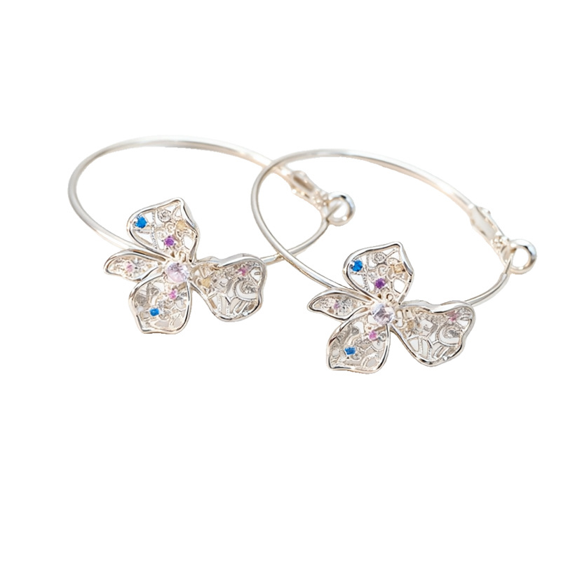 Aguja de plata Zircon hueco flores mariposa pendientes ligeros de lujo de alta calidad personalidad nicho temperamento moda pendientes mujeres