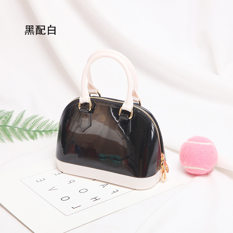 2025 primavera y verano estilo caliente moda casual niños dulces bolsa de gelatina mini bolso de mensajero de un solo hombro variedad al por mayor