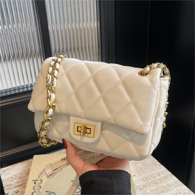 Bolsa de viento de alta calidad, dama 2024, nueva moda, bolso cuadrado de cadena de diamante, bolso de mochila de moda versátil.
