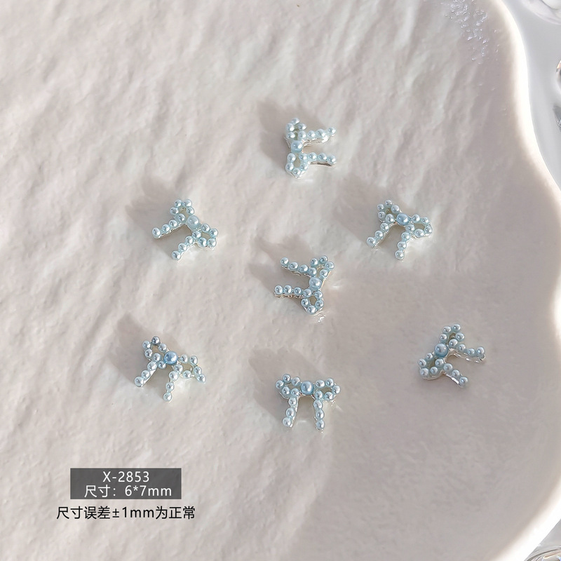 春日甜美简约日韩风珍珠蝴蝶结立体树脂美甲饰品爆款多色系指甲钻|undefined