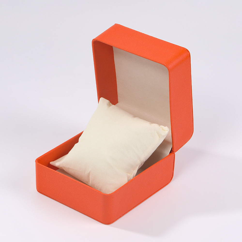 Nueva caja de exhibición de reloj con patrón de lichi con tapa abatible de alta gama, caja de embalaje de reloj de almohada de regalo de vacaciones, caja de almacenamiento al por mayor