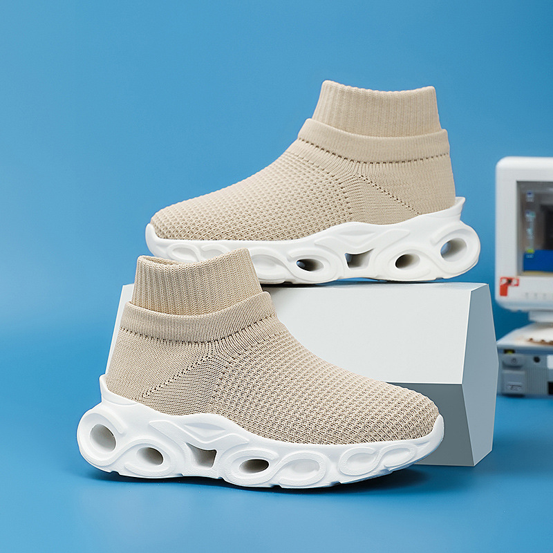 Transfronterizos niños zapatos deportivos de tela de vuelo primavera y verano nuevos niños y niñas malla transpirable ligera universal zapatos de calzado de tela de un pie