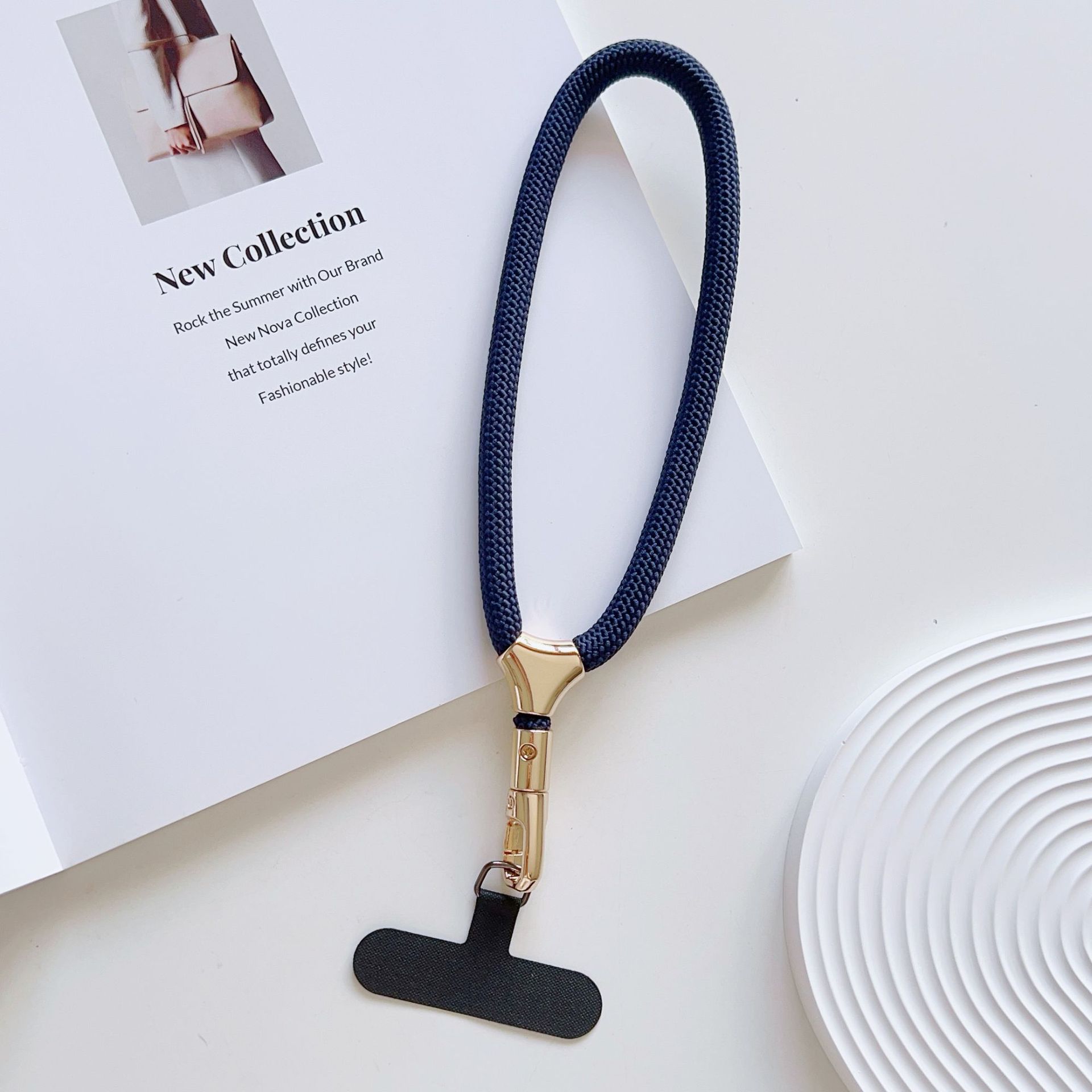 Cuerdas de muñeca ajustables de alta calidad con clips de hebilla pequeñas y frescas de poliéster corto para colgar teléfonos móviles simples y versátiles