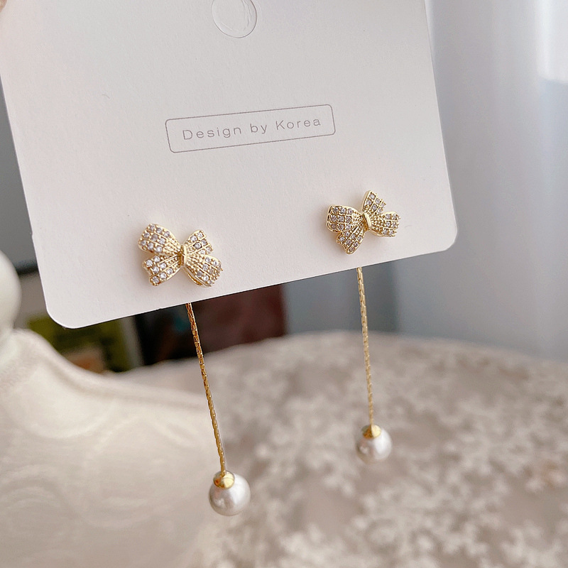 Korean New Simple Pearl Bowknot Earrings display picture 2