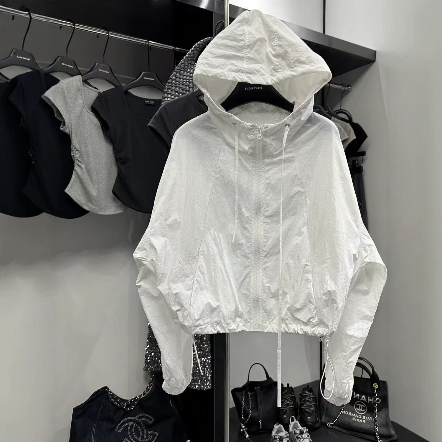 High-end women's windproof and sun-protective jacket, 2026 summer new style, niche Korean casual loose breathable sun protection clothing