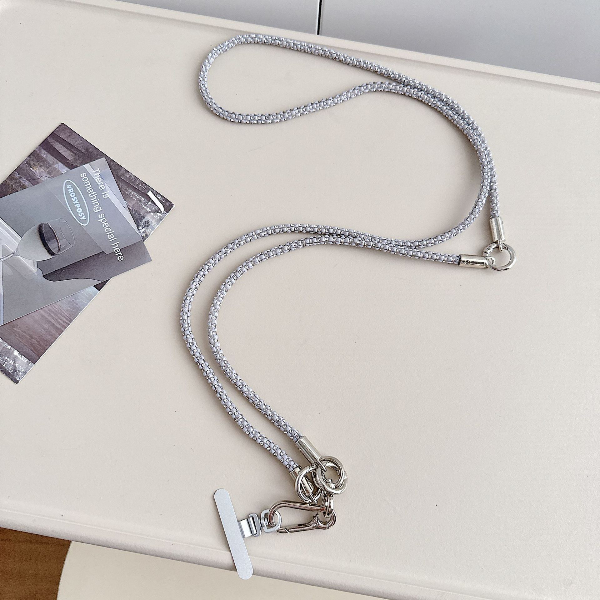 Cadena de teléfono móvil de alta gama hecha a mano de boutique, cordón de teléfono móvil de moda tres en uno de diamantes de lujo, mensajero largo/colgante