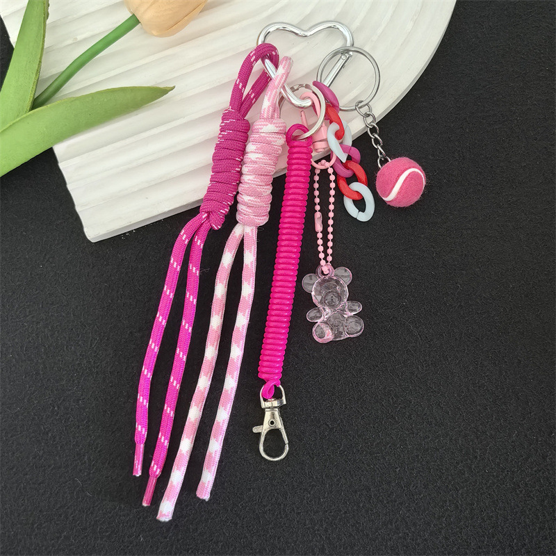 Llavero de cuero estilo MIU con colgante de estrella de fresa, accesorio de alta gama para llaves de coche.