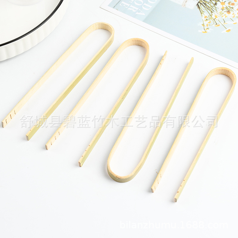 Fábrica al por mayor abrazadera de alimentos de bambú, abrazadera de frutas de bambú, abrazadera de alimentos de carbón de bambú no quemado