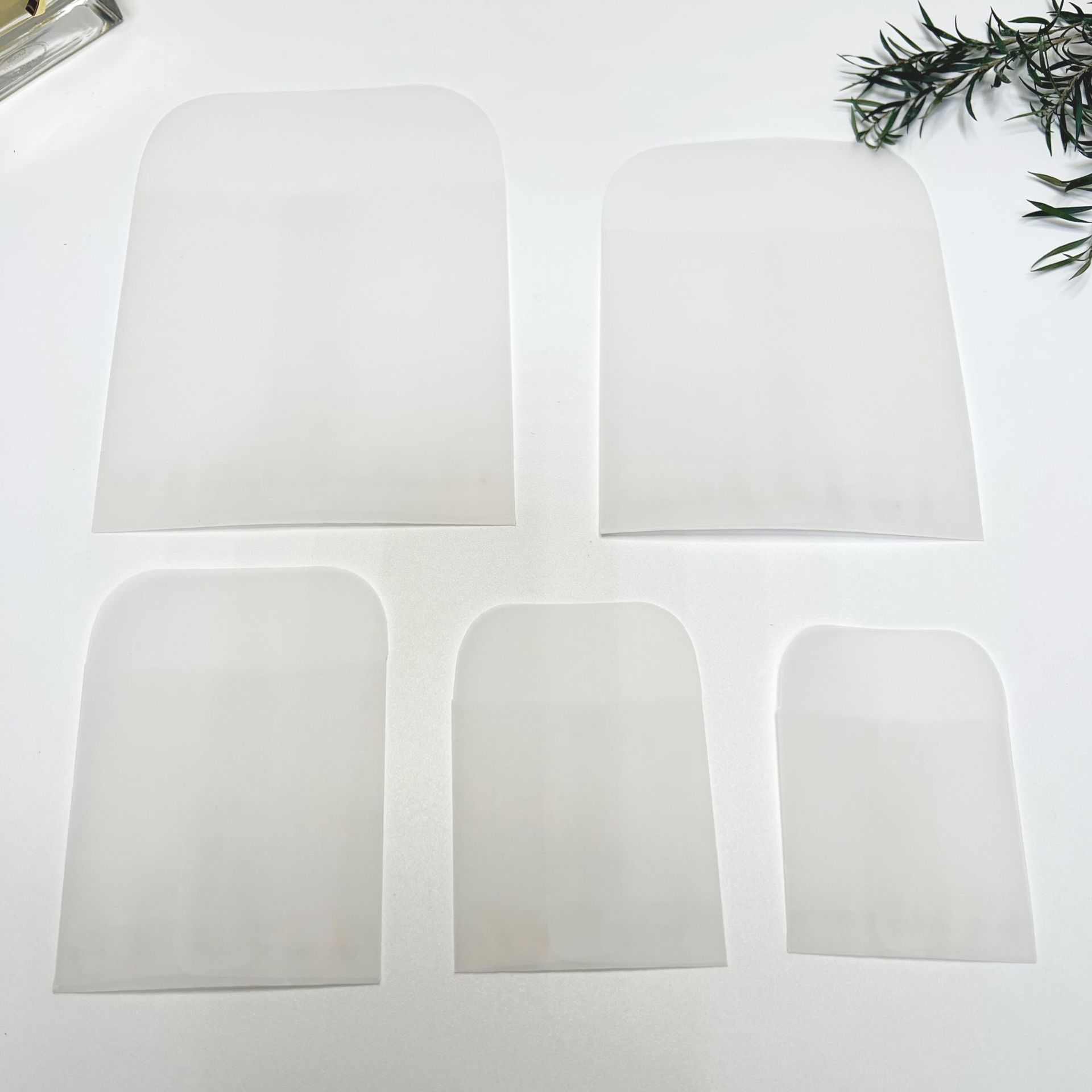 Bolsa de papel de ácido sulfúrico transparente en stock Bolsa De Joyería Al por mayor bolsa de sobre pequeña bolsa de papel translúcido bolsa de botón con logotipo